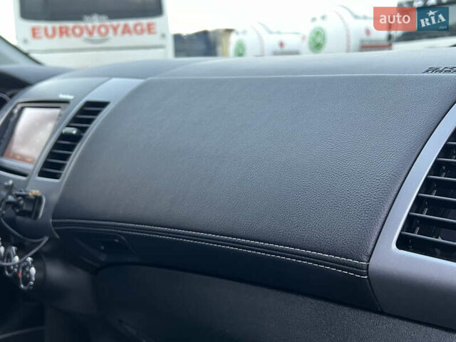 Чорний Міцубісі Аутлендер, об'ємом двигуна 2.3 л та пробігом 124 тис. км за 11999 $, фото 66 на Automoto.ua