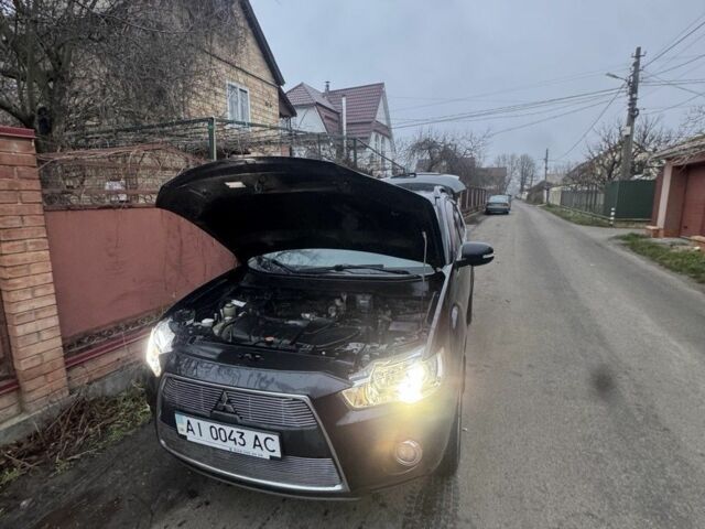 Черный Мицубиси Аутлендер, объемом двигателя 2.4 л и пробегом 136 тыс. км за 14500 $, фото 4 на Automoto.ua