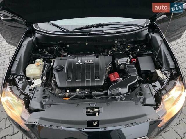 Черный Мицубиси Аутлендер, объемом двигателя 2.2 л и пробегом 188 тыс. км за 10999 $, фото 22 на Automoto.ua