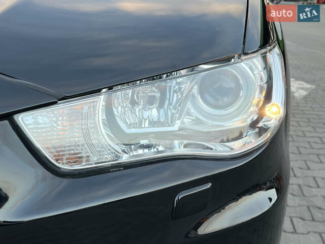 Чорний Міцубісі Аутлендер, об'ємом двигуна 2.3 л та пробігом 124 тис. км за 11999 $, фото 27 на Automoto.ua