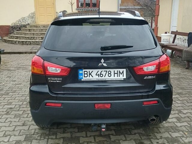 Міцубісі Аутлендер 2012 у Костополе на Automoto.ua Чорний Міцубісі Аутлендер, об'ємом двигуна 1.8 л та пробігом 248 тис. км за 10500 $, фото 1 на Automoto.ua