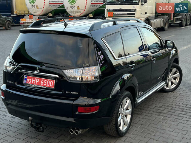 Чорний Міцубісі Аутлендер, об'ємом двигуна 2.3 л та пробігом 124 тис. км за 11999 $, фото 1 на Automoto.ua