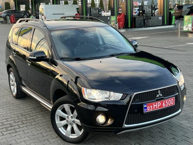 Черный Мицубиси Аутлендер, объемом двигателя 2.3 л и пробегом 124 тыс. км за 11999 $, фото 2 на Automoto.ua
