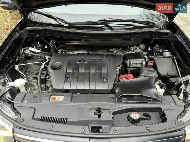 Чорний Міцубісі Аутлендер, об'ємом двигуна 2.2 л та пробігом 176 тис. км за 13500 $, фото 35 на Automoto.ua