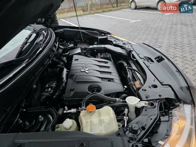 Черный Мицубиси Аутлендер, объемом двигателя 2.2 л и пробегом 188 тыс. км за 10999 $, фото 26 на Automoto.ua