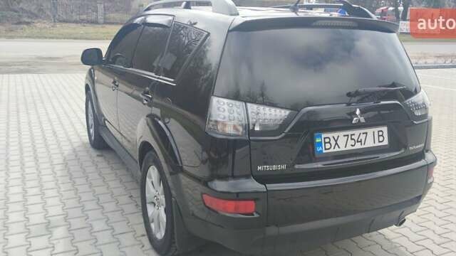 Чорний Міцубісі Аутлендер, об'ємом двигуна 2.36 л та пробігом 137 тис. км за 11200 $, фото 21 на Automoto.ua