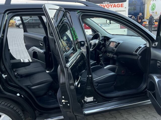 Черный Мицубиси Аутлендер, объемом двигателя 2.3 л и пробегом 124 тыс. км за 11999 $, фото 11 на Automoto.ua