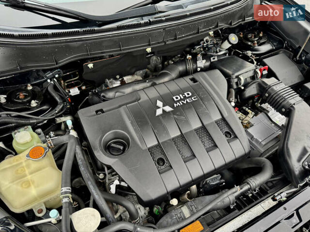 Черный Мицубиси Аутлендер, объемом двигателя 2.2 л и пробегом 215 тыс. км за 11450 $, фото 35 на Automoto.ua