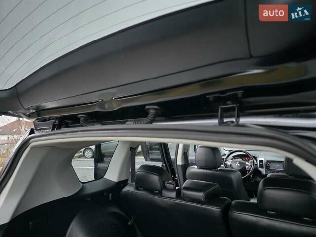 Черный Мицубиси Аутлендер, объемом двигателя 2.2 л и пробегом 188 тыс. км за 10999 $, фото 31 на Automoto.ua