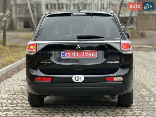 Чорний Міцубісі Аутлендер, об'ємом двигуна 2.2 л та пробігом 176 тис. км за 13500 $, фото 9 на Automoto.ua