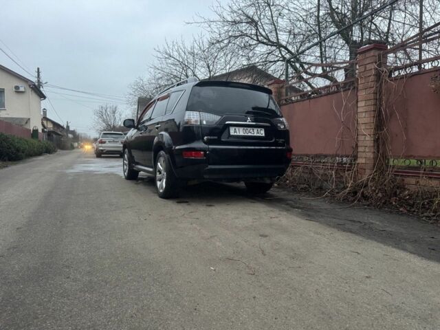 Черный Мицубиси Аутлендер, объемом двигателя 2.4 л и пробегом 136 тыс. км за 14500 $, фото 7 на Automoto.ua