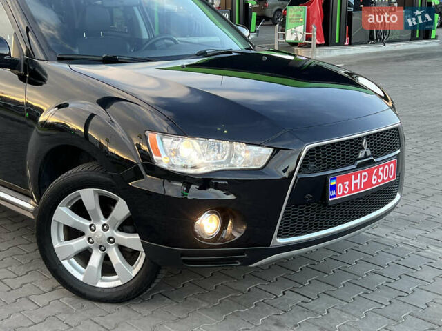 Чорний Міцубісі Аутлендер, об'ємом двигуна 2.3 л та пробігом 124 тис. км за 11999 $, фото 4 на Automoto.ua