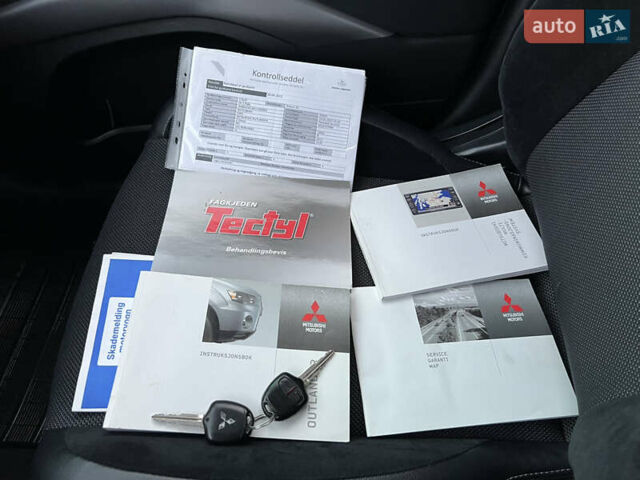 Чорний Міцубісі Аутлендер, об'ємом двигуна 2.3 л та пробігом 124 тис. км за 11999 $, фото 102 на Automoto.ua