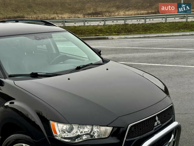 Черный Мицубиси Аутлендер, объемом двигателя 2.2 л и пробегом 215 тыс. км за 11450 $, фото 7 на Automoto.ua