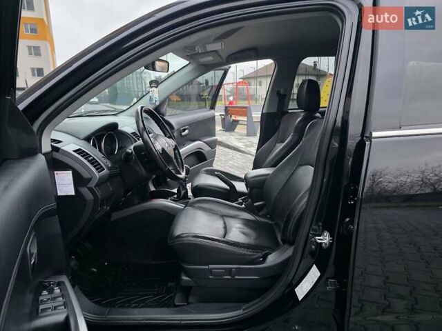 Черный Мицубиси Аутлендер, объемом двигателя 2.2 л и пробегом 188 тыс. км за 10999 $, фото 54 на Automoto.ua