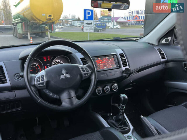 Чорний Міцубісі Аутлендер, об'ємом двигуна 2.3 л та пробігом 124 тис. км за 11999 $, фото 34 на Automoto.ua