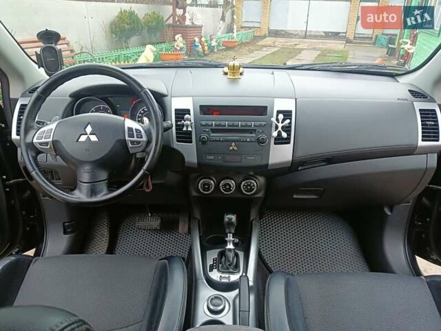 Черный Мицубиси Аутлендер, объемом двигателя 2.2 л и пробегом 218 тыс. км за 11500 $, фото 20 на Automoto.ua