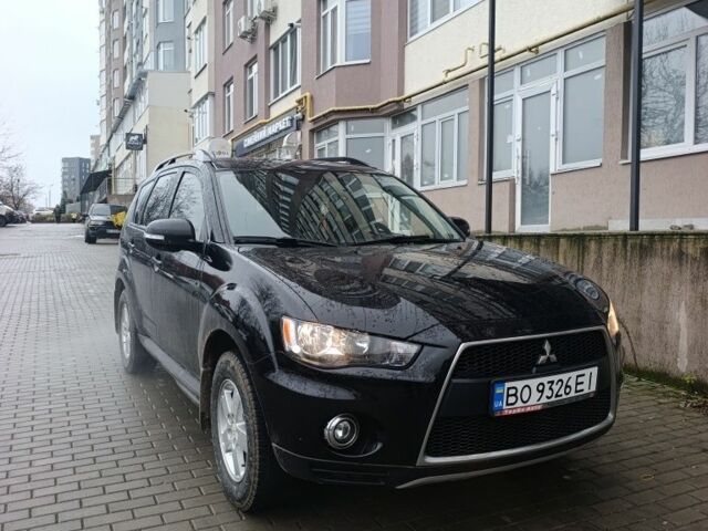 Черный Мицубиси Аутлендер, объемом двигателя 2 л и пробегом 235 тыс. км за 10300 $, фото 7 на Automoto.ua