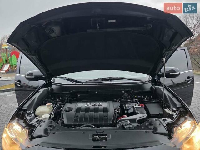 Черный Мицубиси Аутлендер, объемом двигателя 2.2 л и пробегом 188 тыс. км за 10999 $, фото 23 на Automoto.ua