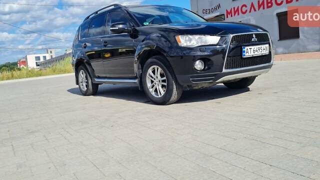 Черный Мицубиси Аутлендер, объемом двигателя 2.27 л и пробегом 195 тыс. км за 10500 $, фото 1 на Automoto.ua
