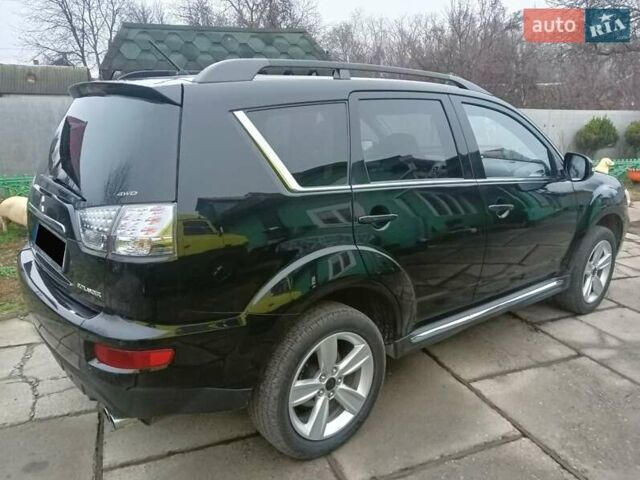 Черный Мицубиси Аутлендер, объемом двигателя 2.2 л и пробегом 218 тыс. км за 11500 $, фото 9 на Automoto.ua