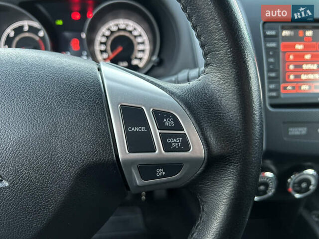 Чорний Міцубісі Аутлендер, об'ємом двигуна 2.3 л та пробігом 124 тис. км за 11999 $, фото 45 на Automoto.ua