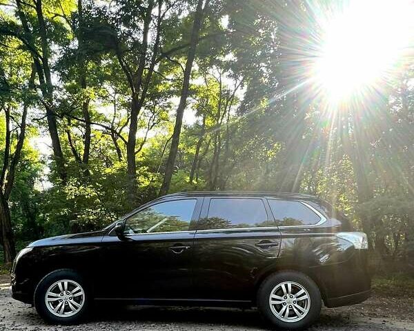 Чорний Міцубісі Аутлендер, об'ємом двигуна 2.27 л та пробігом 250 тис. км за 12200 $, фото 18 на Automoto.ua