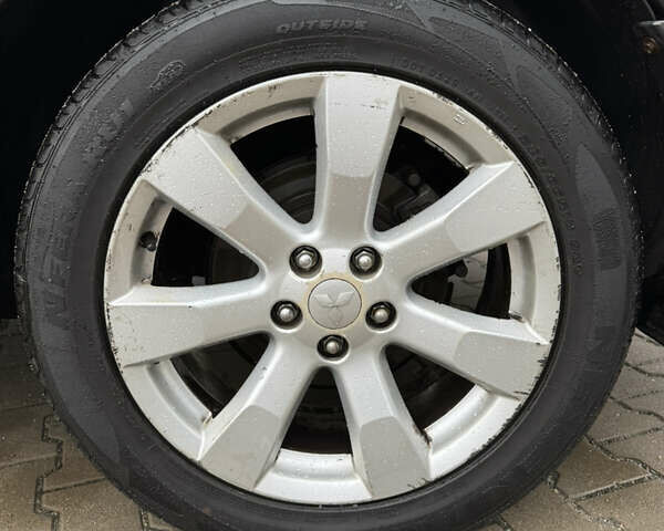 Чорний Міцубісі Аутлендер, об'ємом двигуна 2.36 л та пробігом 96 тис. км за 11700 $, фото 12 на Automoto.ua