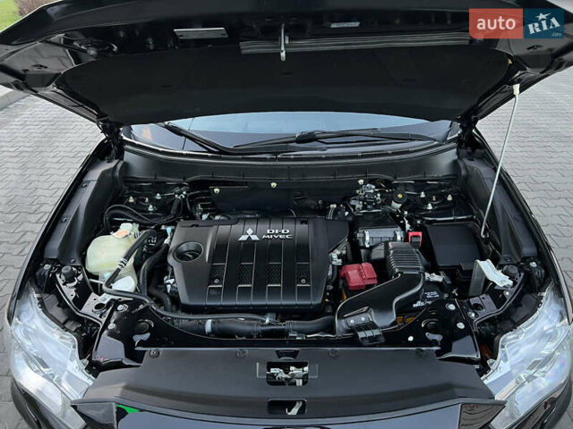 Чорний Міцубісі Аутлендер, об'ємом двигуна 2.3 л та пробігом 124 тис. км за 11999 $, фото 93 на Automoto.ua