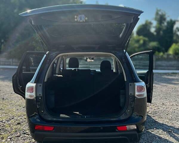 Чорний Міцубісі Аутлендер, об'ємом двигуна 2.27 л та пробігом 250 тис. км за 12200 $, фото 12 на Automoto.ua