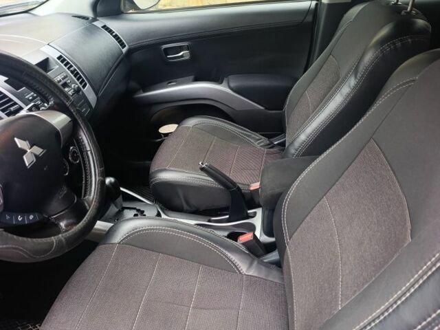 Черный Мицубиси Аутлендер, объемом двигателя 2 л и пробегом 235 тыс. км за 10300 $, фото 3 на Automoto.ua