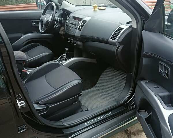 Черный Мицубиси Аутлендер, объемом двигателя 2.2 л и пробегом 218 тыс. км за 11500 $, фото 10 на Automoto.ua