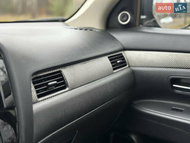 Чорний Міцубісі Аутлендер, об'ємом двигуна 2.2 л та пробігом 176 тис. км за 13500 $, фото 21 на Automoto.ua