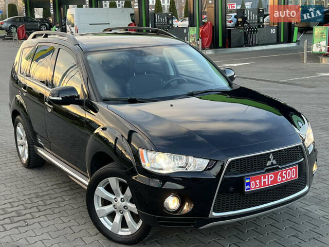 Чорний Міцубісі Аутлендер, об'ємом двигуна 2.3 л та пробігом 124 тис. км за 11999 $, фото 2 на Automoto.ua