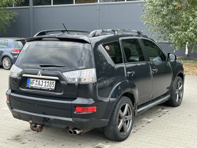 Черный Мицубиси Аутлендер, объемом двигателя 2 л и пробегом 250 тыс. км за 4850 $, фото 4 на Automoto.ua