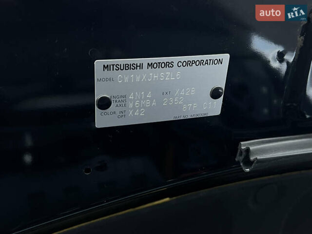 Чорний Міцубісі Аутлендер, об'ємом двигуна 2.3 л та пробігом 124 тис. км за 11999 $, фото 101 на Automoto.ua
