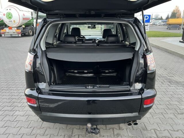 Черный Мицубиси Аутлендер, объемом двигателя 2.3 л и пробегом 124 тыс. км за 11999 $, фото 19 на Automoto.ua