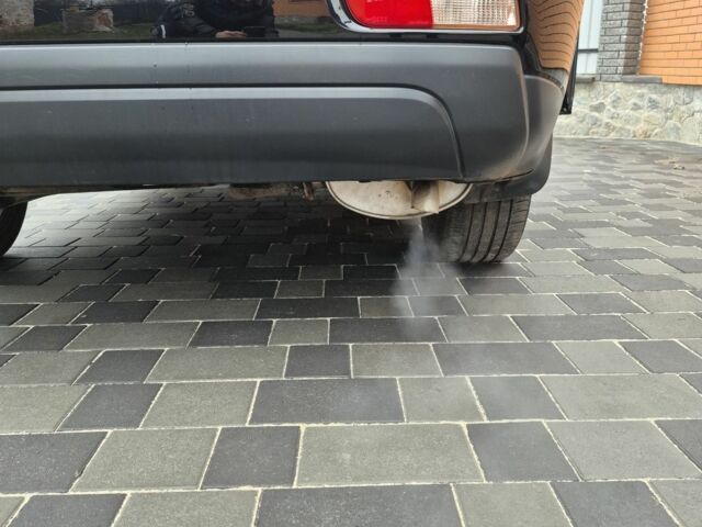 Черный Мицубиси Аутлендер, объемом двигателя 2.4 л и пробегом 211 тыс. км за 12590 $, фото 22 на Automoto.ua