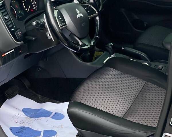 Черный Мицубиси Аутлендер, объемом двигателя 2.36 л и пробегом 212 тыс. км за 12990 $, фото 18 на Automoto.ua