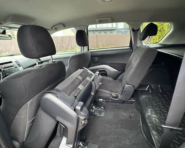 Чорний Міцубісі Аутлендер, об'ємом двигуна 2.36 л та пробігом 96 тис. км за 11700 $, фото 26 на Automoto.ua