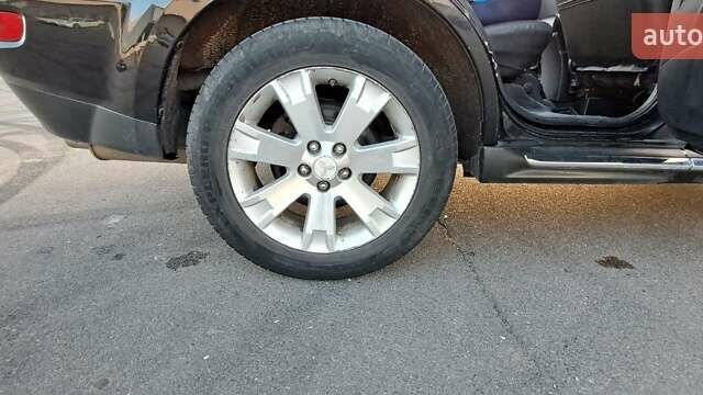 Черный Мицубиси Аутлендер, объемом двигателя 2.36 л и пробегом 285 тыс. км за 11300 $, фото 10 на Automoto.ua