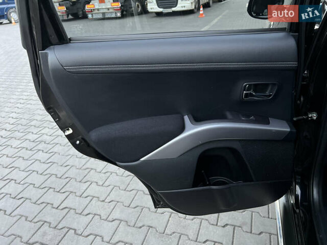 Чорний Міцубісі Аутлендер, об'ємом двигуна 2.3 л та пробігом 124 тис. км за 11999 $, фото 76 на Automoto.ua