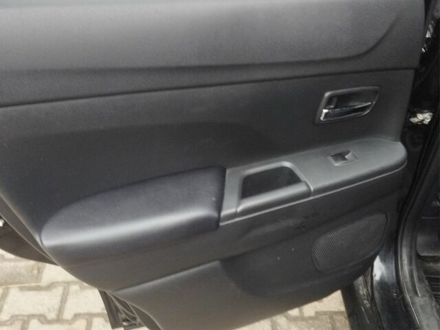 Міцубісі Аутлендер 2012 у Костополе на Automoto.ua Чорний Міцубісі Аутлендер, об'ємом двигуна 1.8 л та пробігом 248 тис. км за 10500 $, фото 8 на Automoto.ua