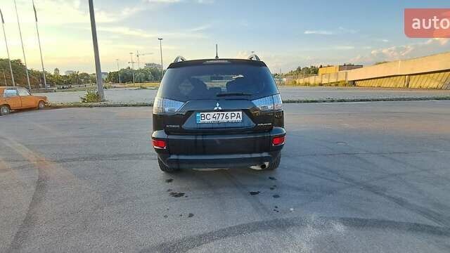 Черный Мицубиси Аутлендер, объемом двигателя 2.36 л и пробегом 285 тыс. км за 11300 $, фото 24 на Automoto.ua