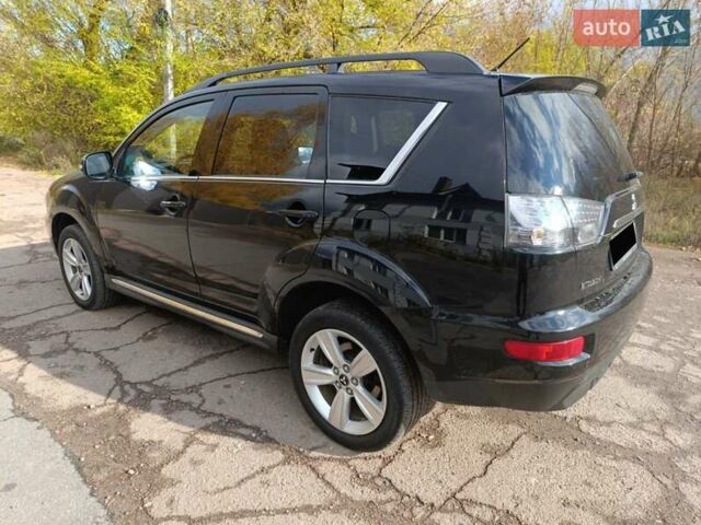 Черный Мицубиси Аутлендер, объемом двигателя 2.2 л и пробегом 218 тыс. км за 11800 $, фото 7 на Automoto.ua