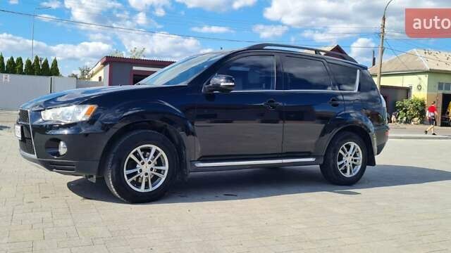 Черный Мицубиси Аутлендер, объемом двигателя 2.27 л и пробегом 195 тыс. км за 10500 $, фото 11 на Automoto.ua