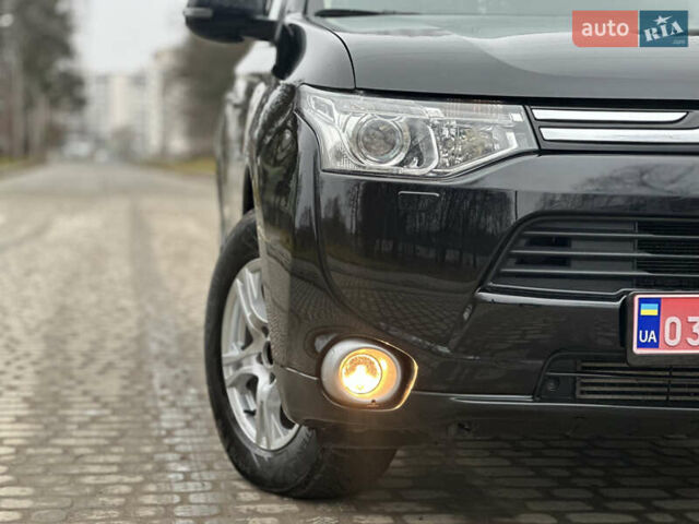 Чорний Міцубісі Аутлендер, об'ємом двигуна 2.2 л та пробігом 176 тис. км за 13500 $, фото 2 на Automoto.ua