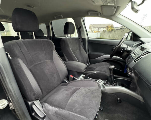 Чорний Міцубісі Аутлендер, об'ємом двигуна 2.36 л та пробігом 96 тис. км за 11700 $, фото 35 на Automoto.ua