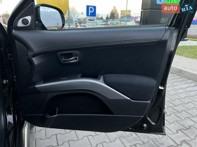Чорний Міцубісі Аутлендер, об'ємом двигуна 2.3 л та пробігом 124 тис. км за 11999 $, фото 83 на Automoto.ua