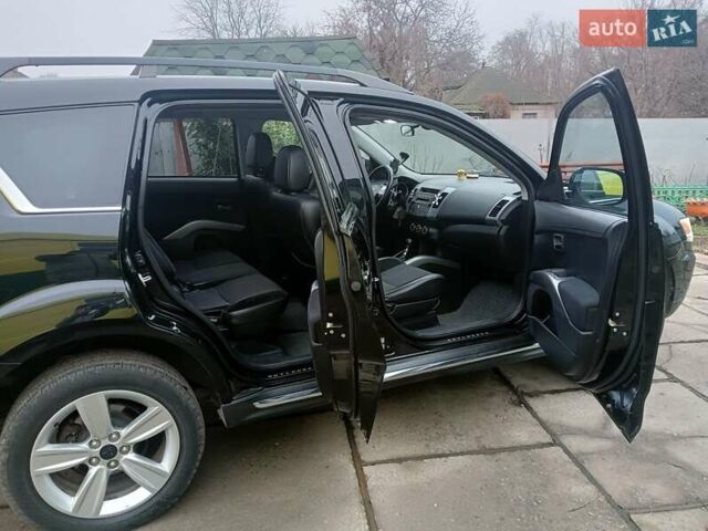 Черный Мицубиси Аутлендер, объемом двигателя 2.2 л и пробегом 218 тыс. км за 11500 $, фото 13 на Automoto.ua